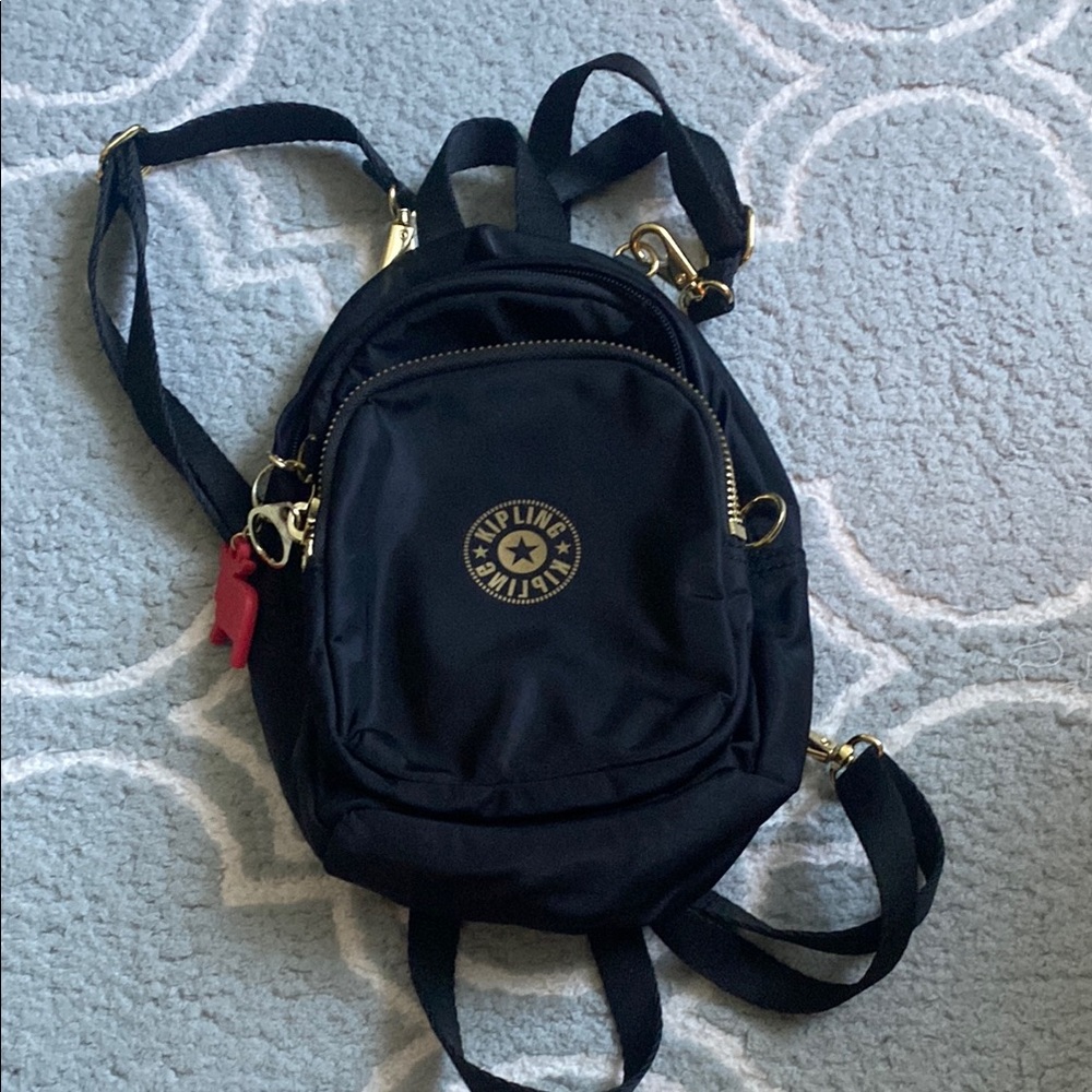 Kipling Black Backpack with Gold Accents